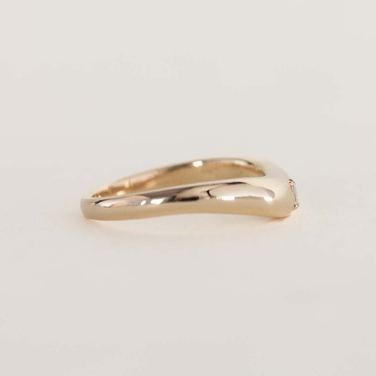 14K chunky gold wedding band with tapered baguette natural diamond