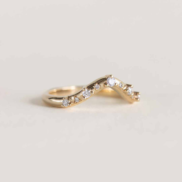 Yellow gold deep curve ring with diamonds