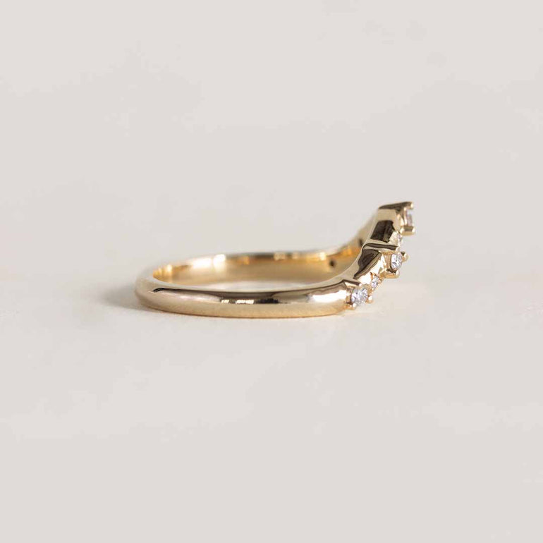 Yellow gold deep curve ring with diamonds