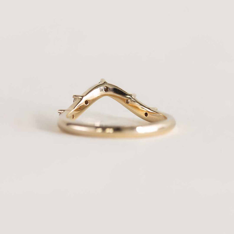 Yellow gold deep curve ring with diamonds