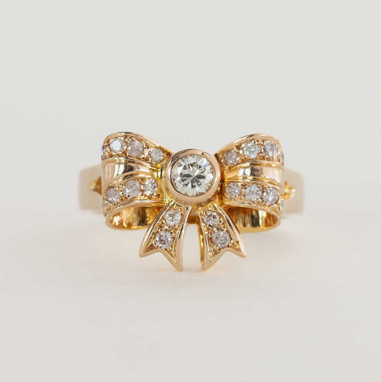 Diamond Bow-Shaped Ring on a Yellow Gold Band