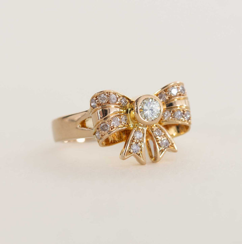Diamond Bow-Shaped Ring on a Yellow Gold Band