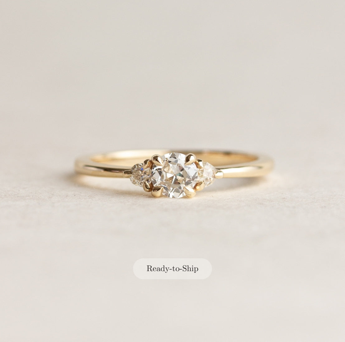 Petite Three Stone Engagement Ring
