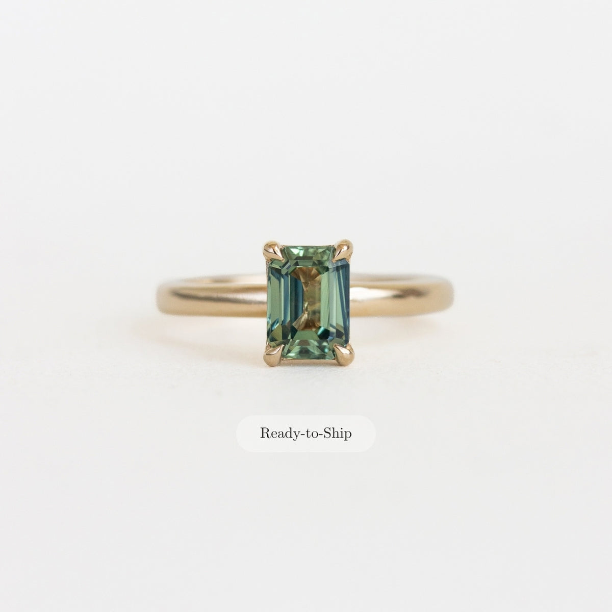 Emerald-cut Montana Teal Sapphire Engagement Ring