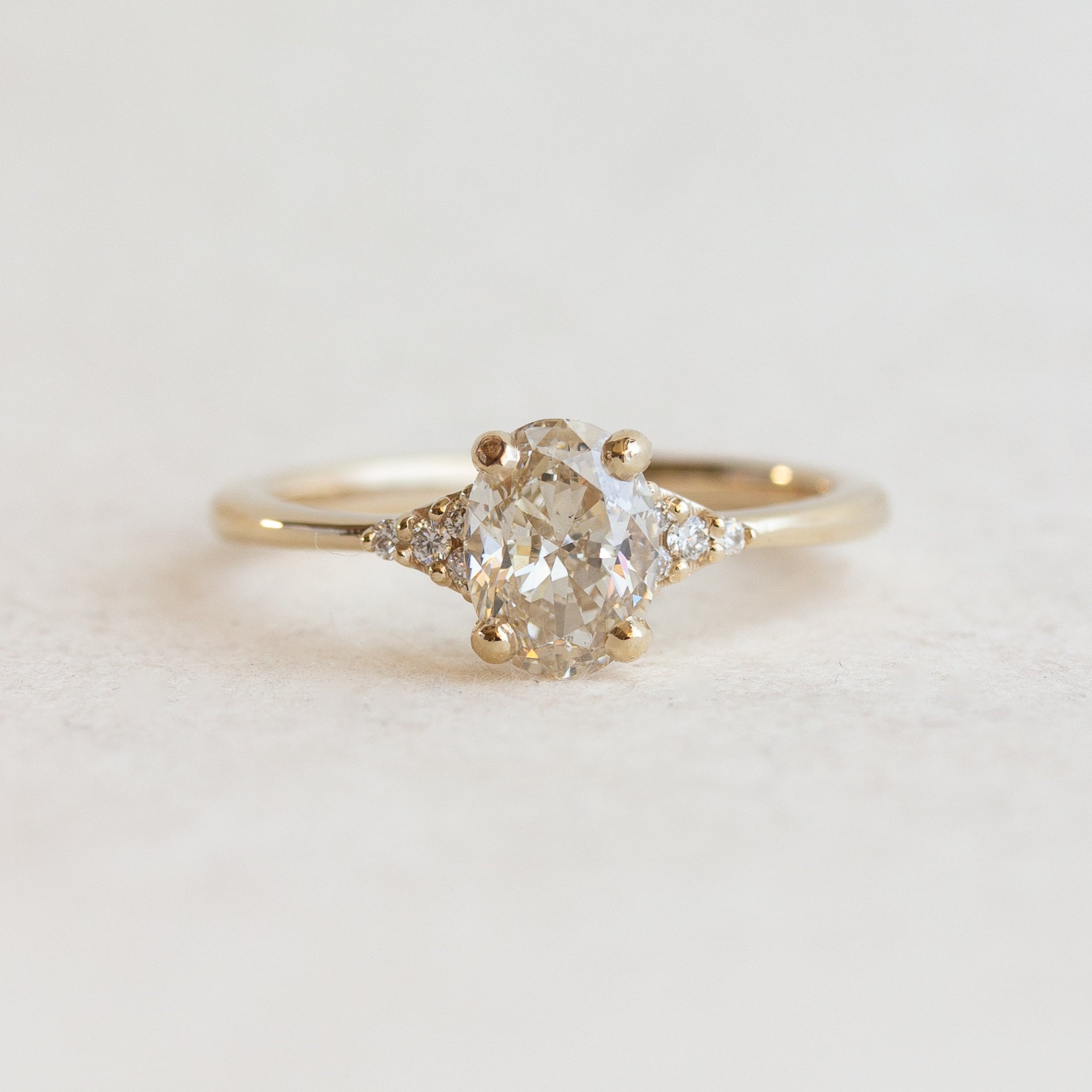 Oval Side Stones Engagement Ring