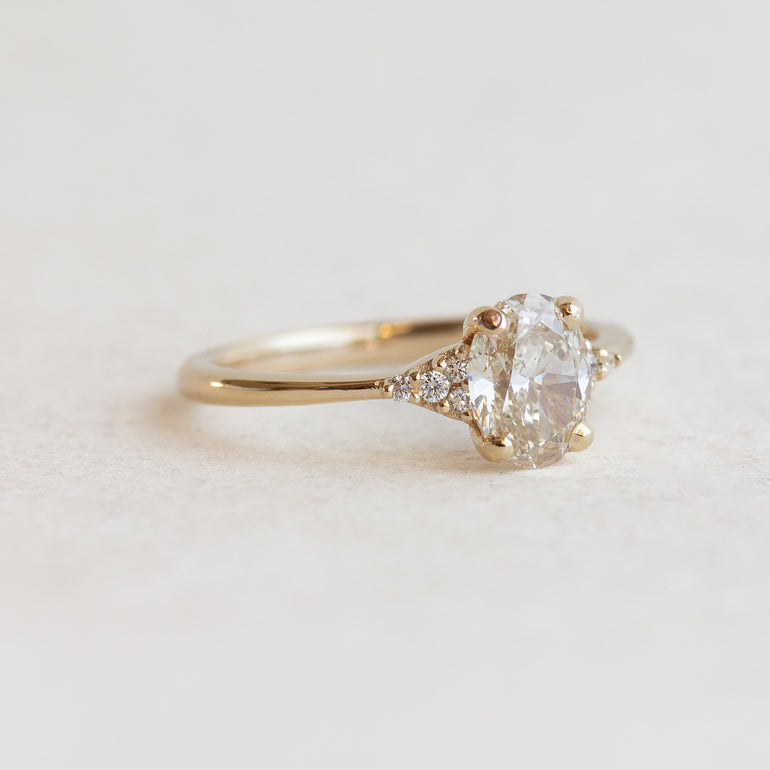 Oval Side Stones Engagement Ring