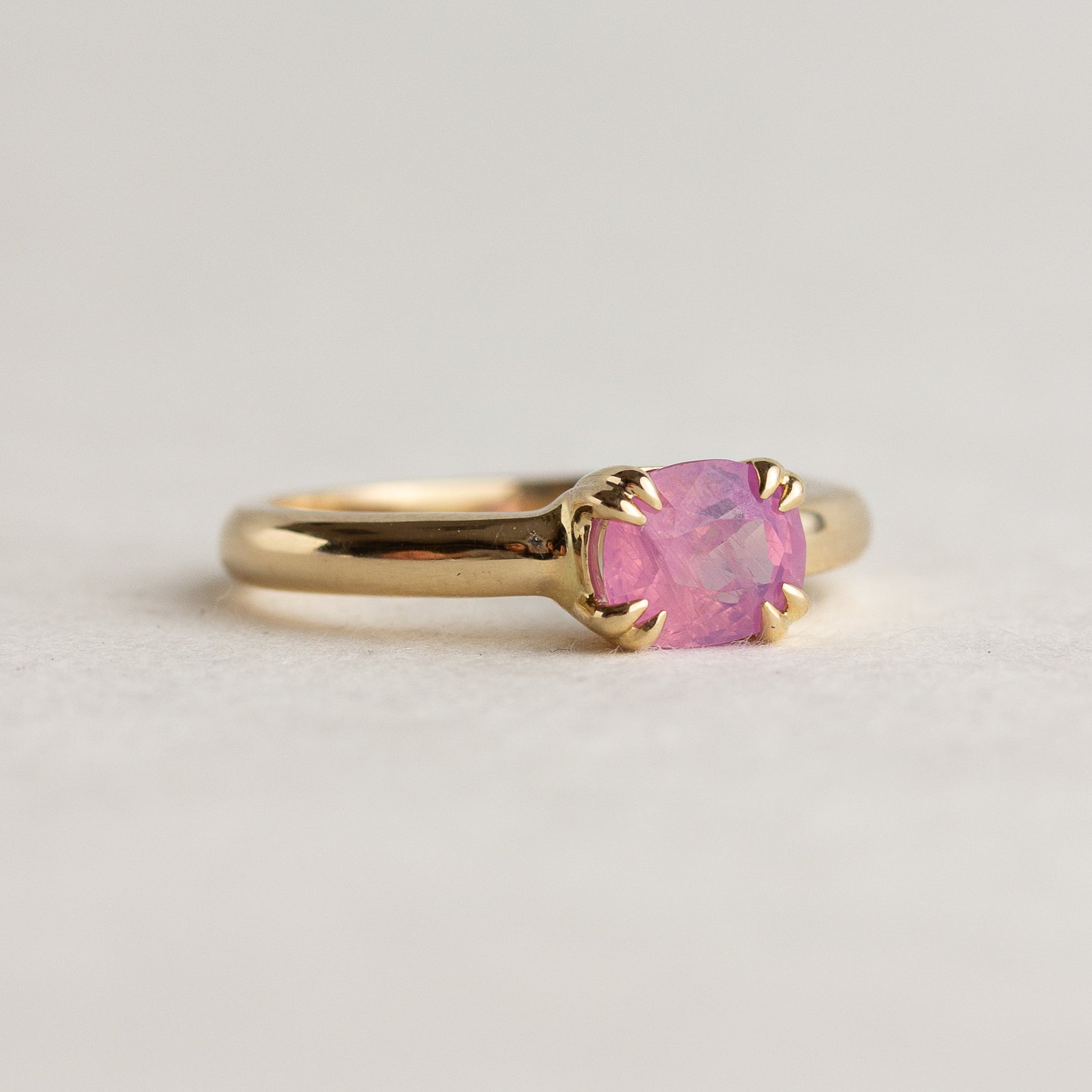 East-West Opalescent Pink Sapphire Ring