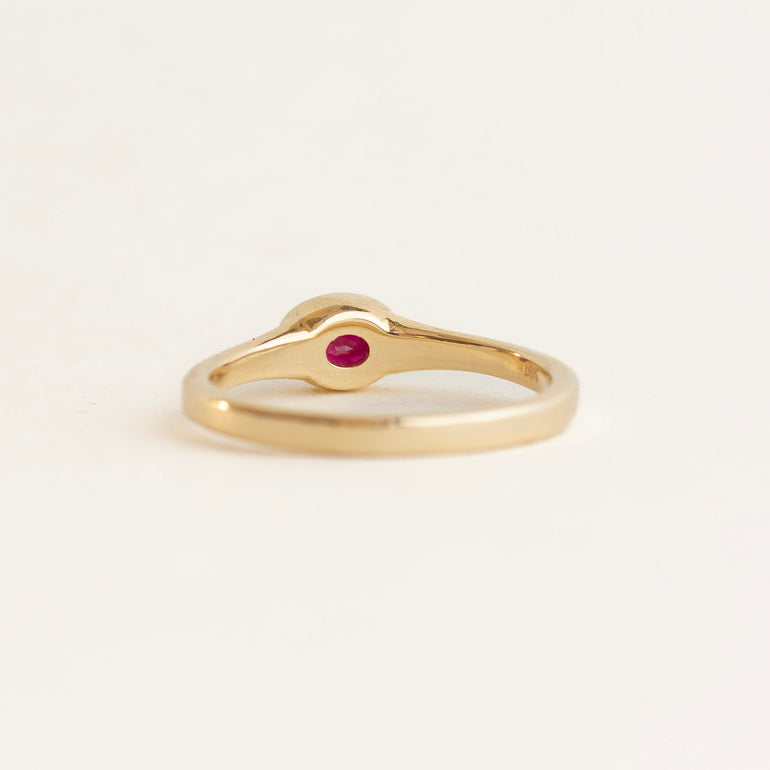 East-West Oval Bezel Ruby Engagement Ring