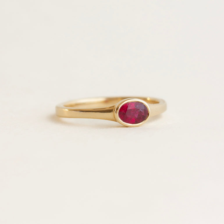 East-West Oval Bezel Ruby Engagement Ring