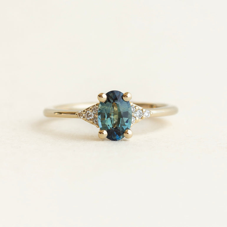 Oval Sapphire Side Stone Engagement Ring