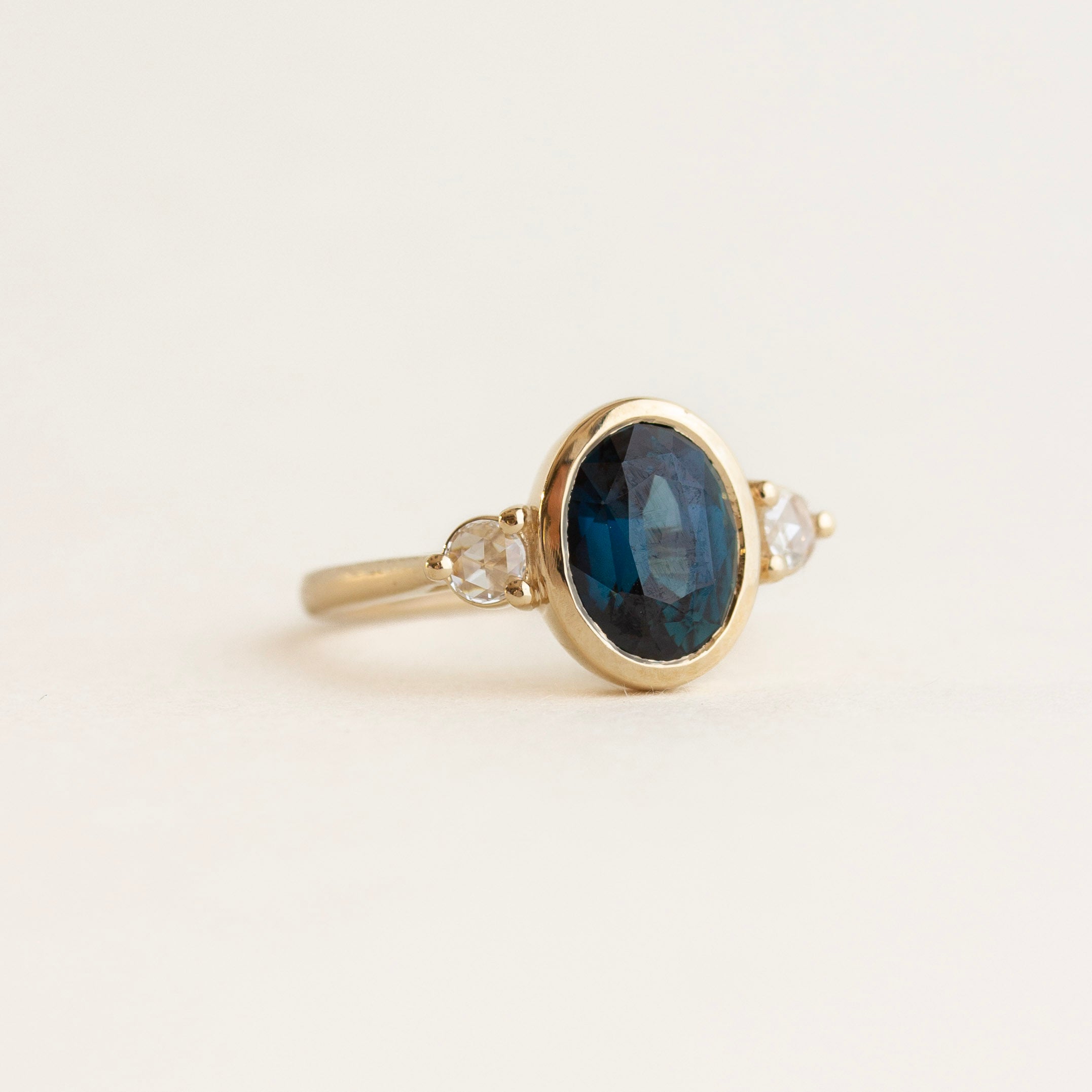 Oval Teal Sapphire Engagement Ring