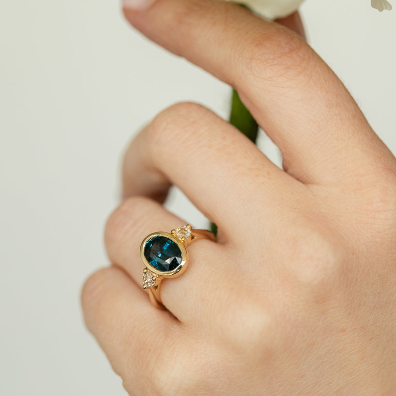 Oval Teal Sapphire Engagement Ring