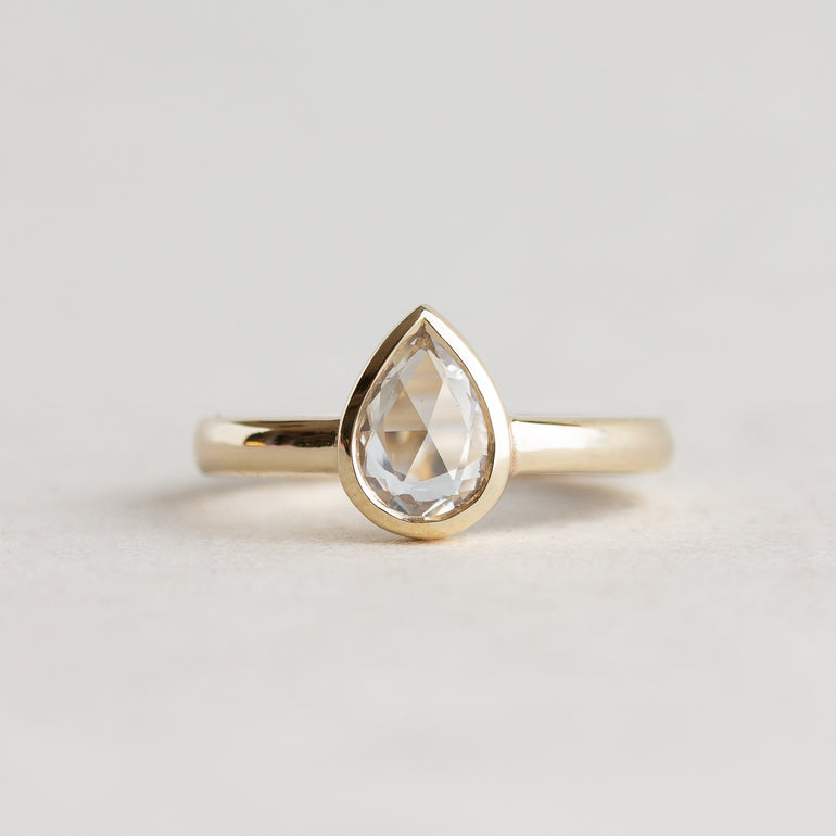 Pear White Stone Bezel Engagement Ring