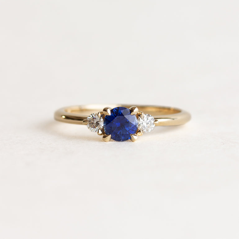 Round Sapphire Side Stone Egnagement Ring