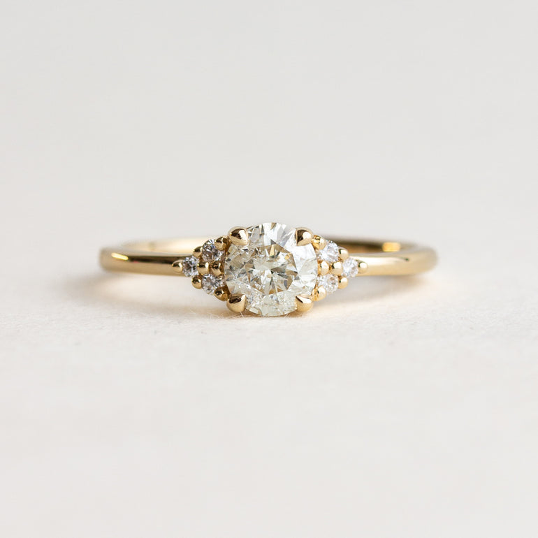 White Round Stone Diamond Side Stones Engagement Ring