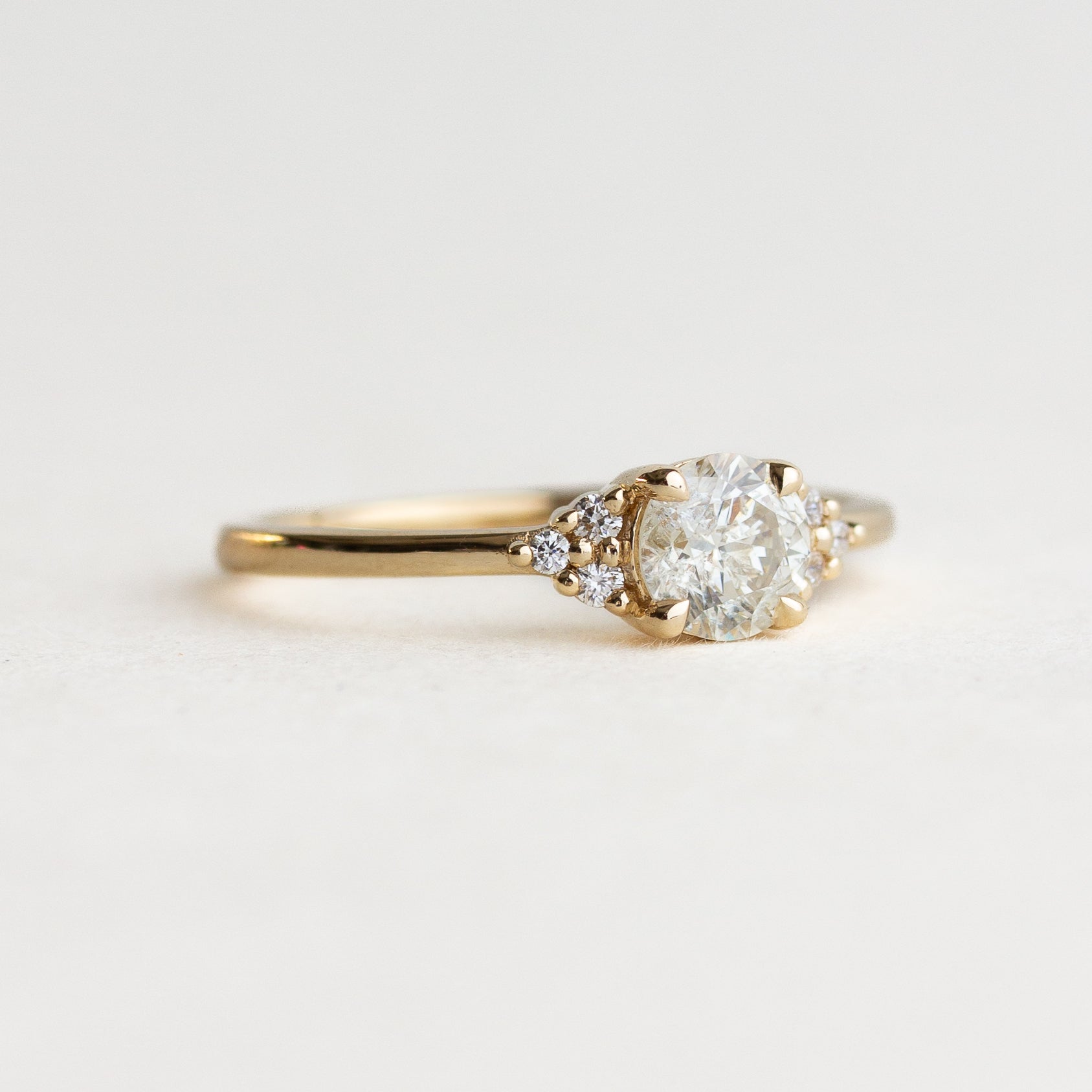 White Round Stone & Side Stone Engagement Ring