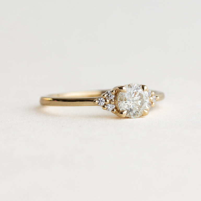 White Round Stone & Side Stone Engagement Ring