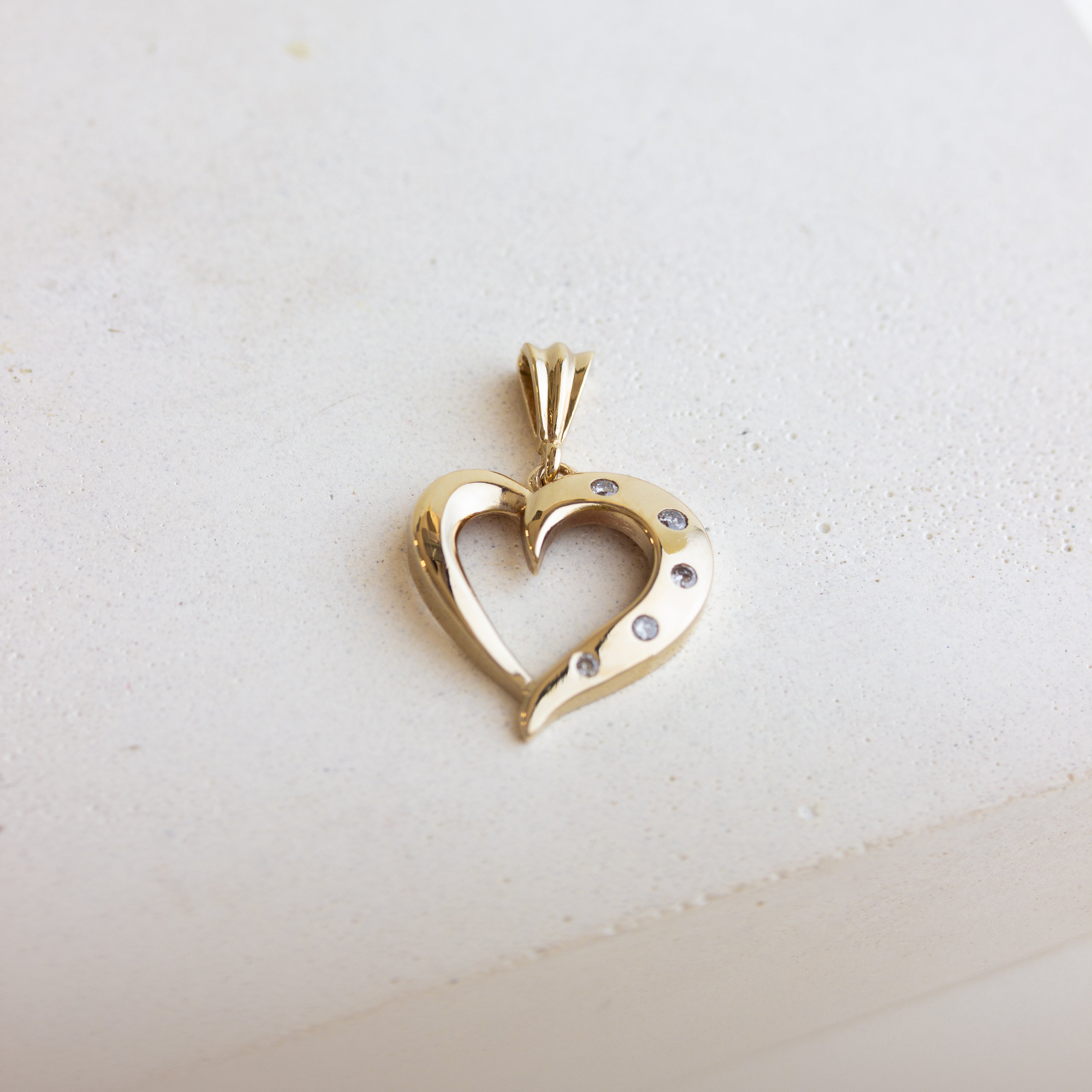 vintage gold open heart with diamonds