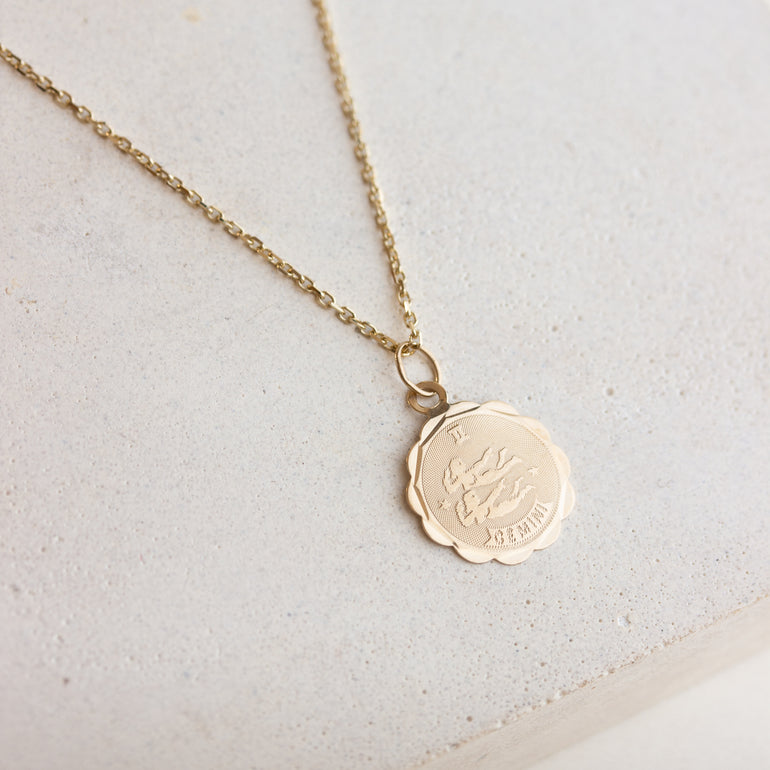 vintage gemini coin charm