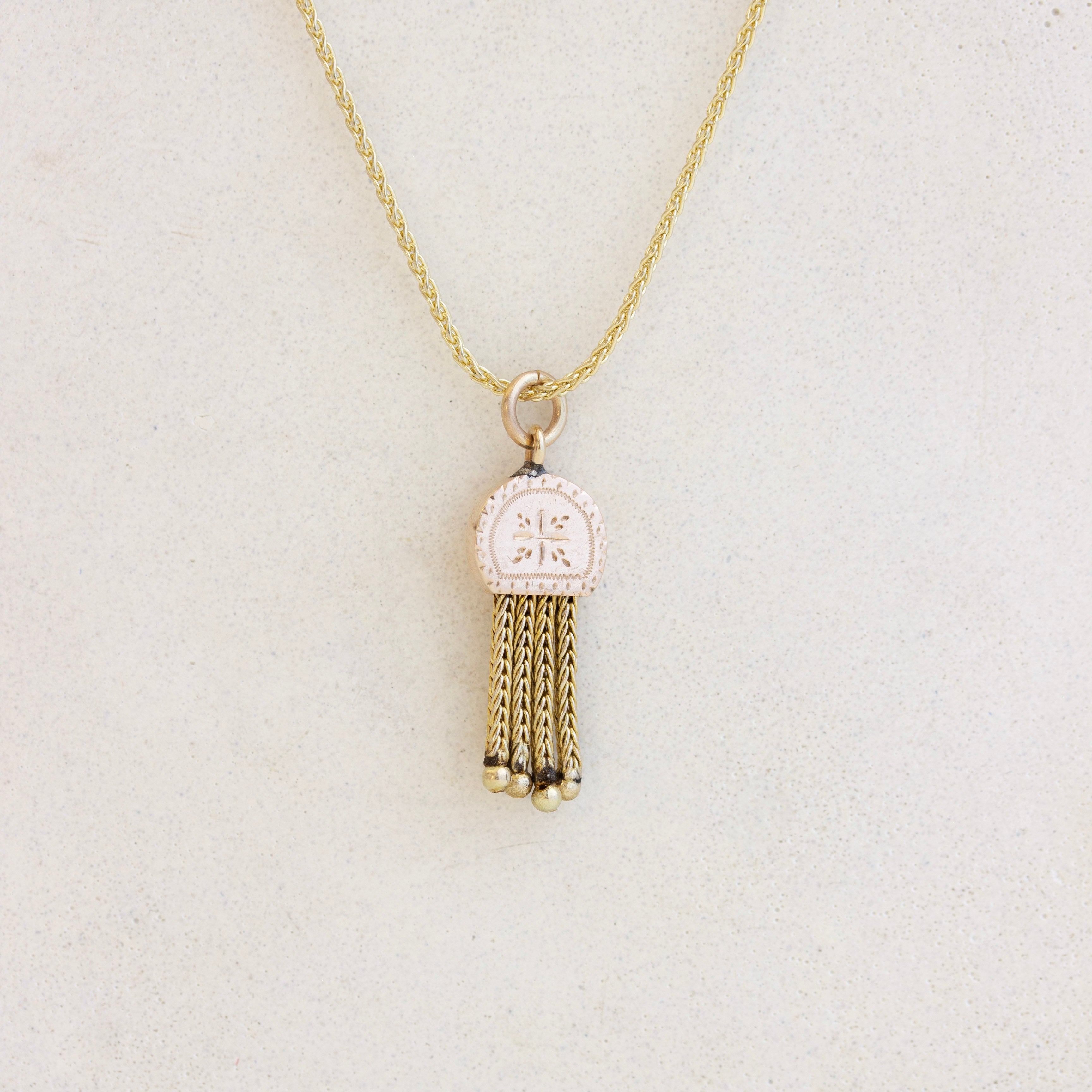 gold tassel charm