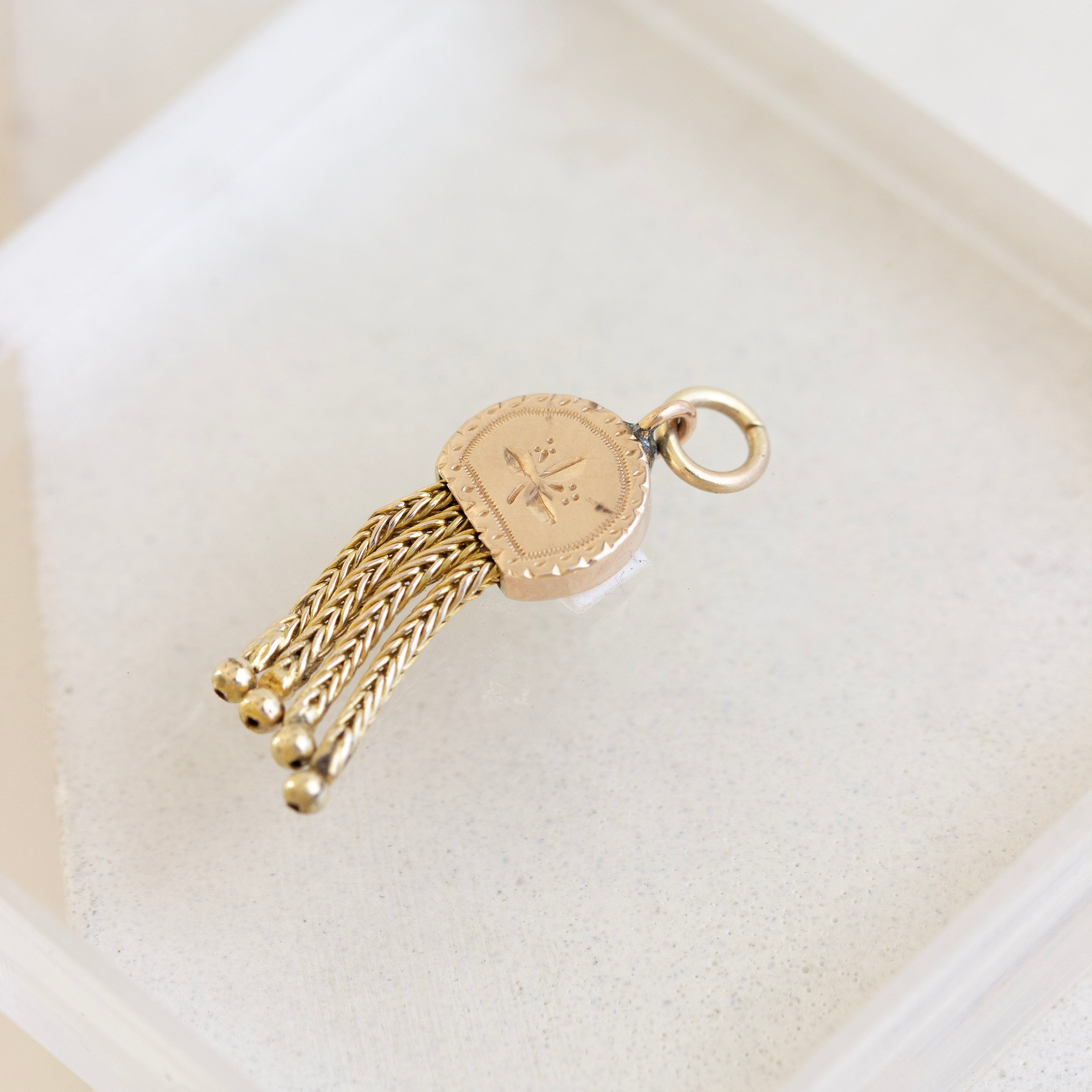 gold tassle charm