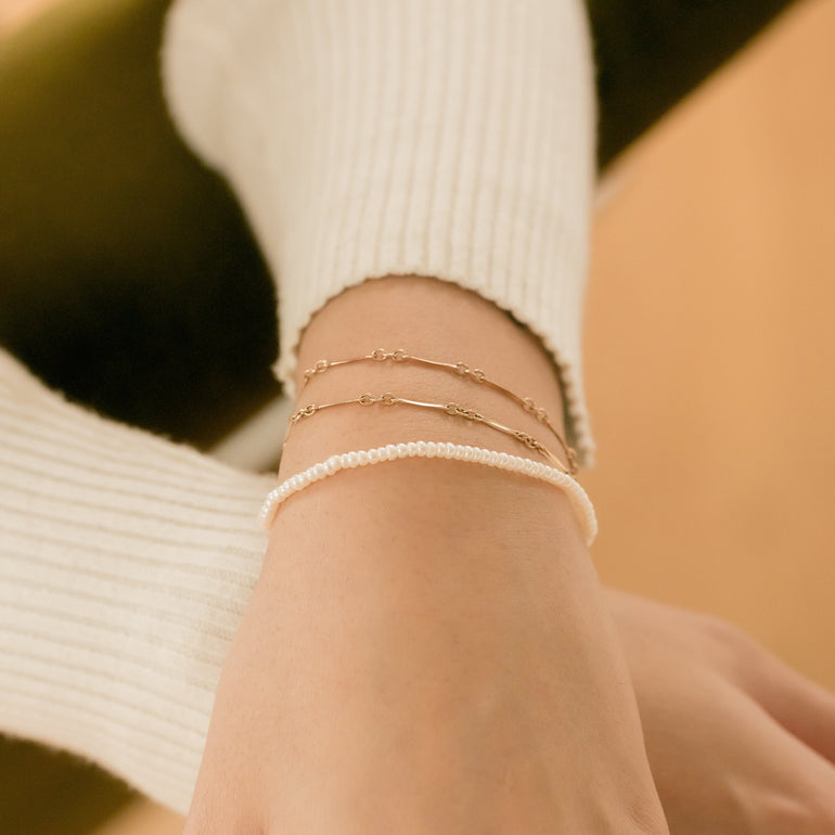 vintage watch chain with pearl extender wrapped as bracelet
