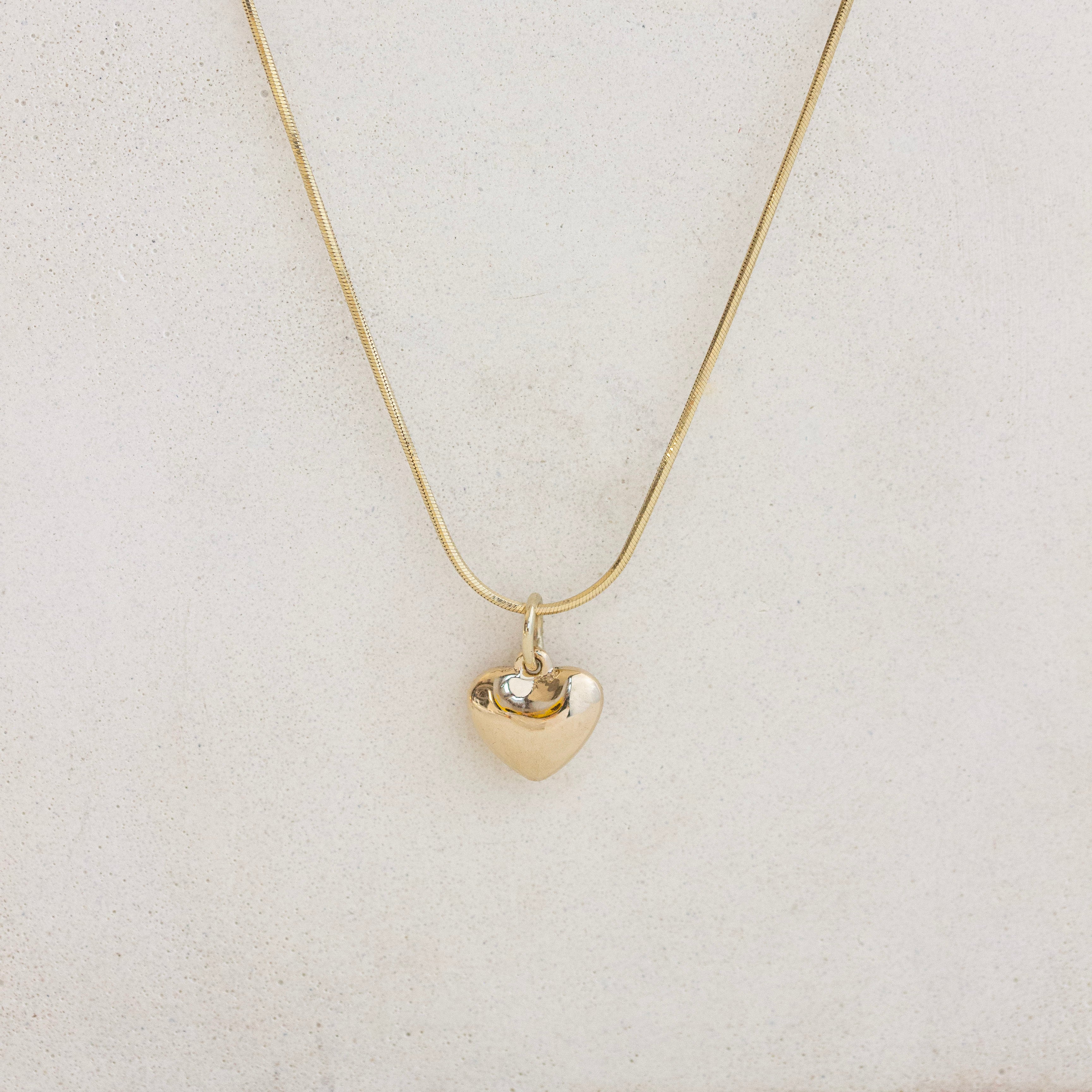snake link chain with heart pendant