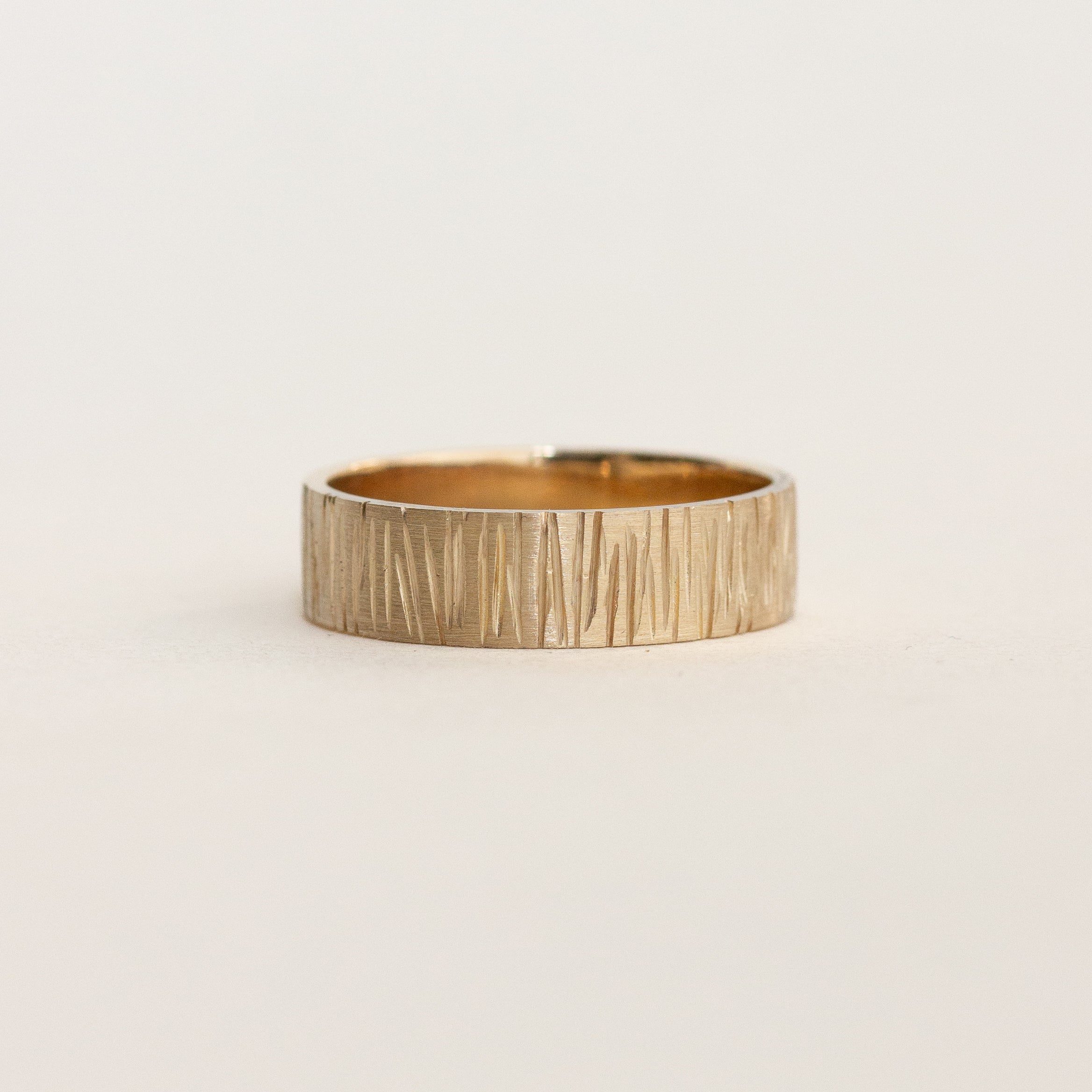 wedding band with cedar texture