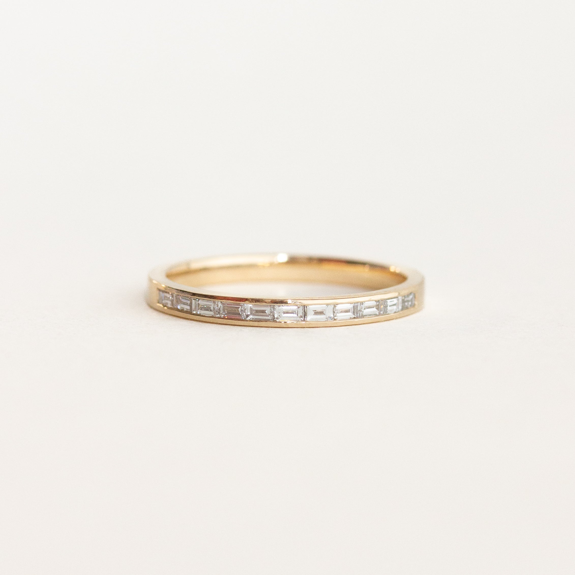 channel set baguette diamond wedding band