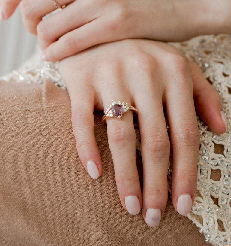 contour diamond wedding band with pear sapphire engagement ring