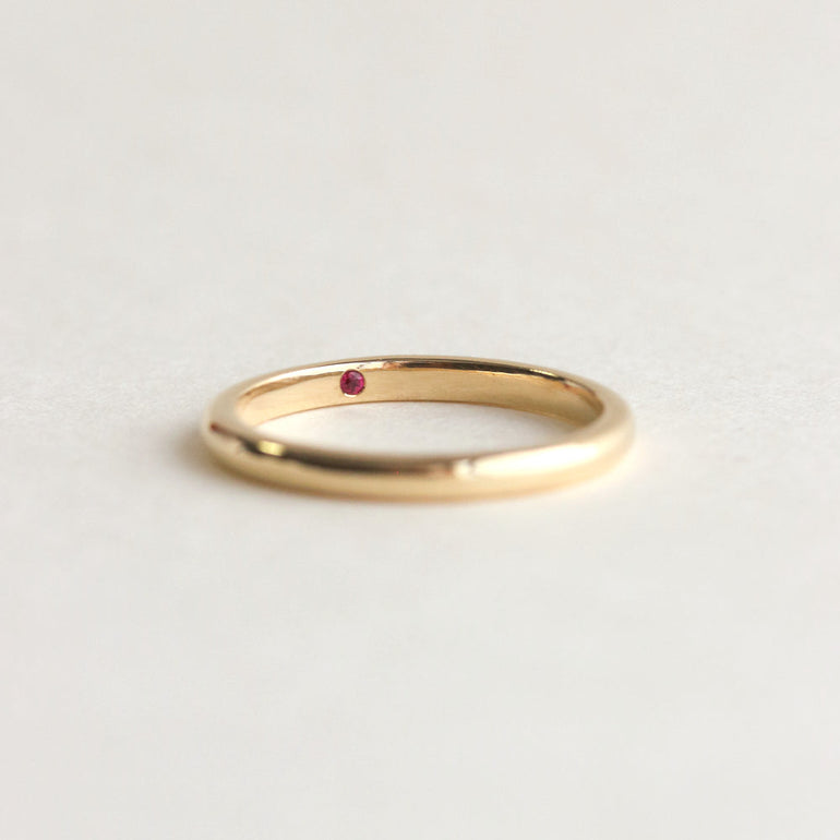 hidden birthstone on thin wedding band