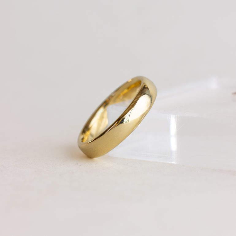 wide , smooth edge wedding band