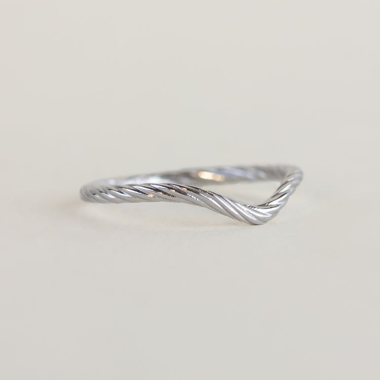 18K white gold rope contour wedding band on a white background