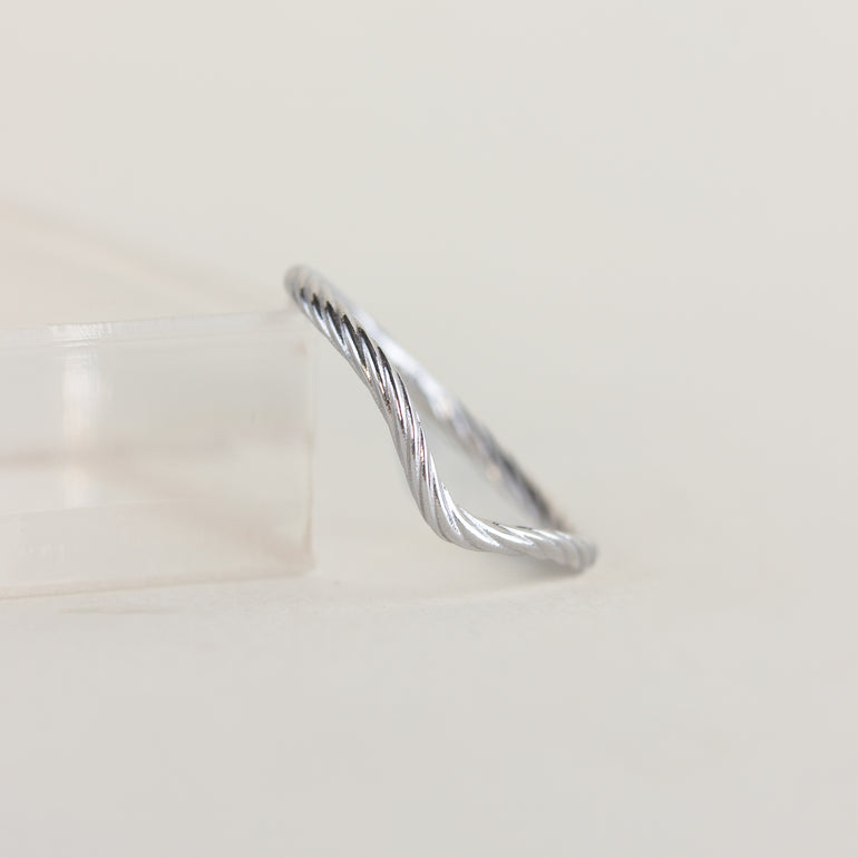 18K white gold rope contour wedding band on a white background