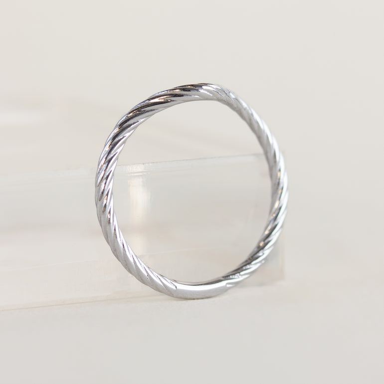 18K white gold rope contour wedding band on a white background