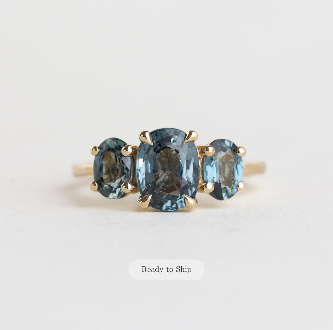 14K gold Isadora ring with three oval blue sapphires