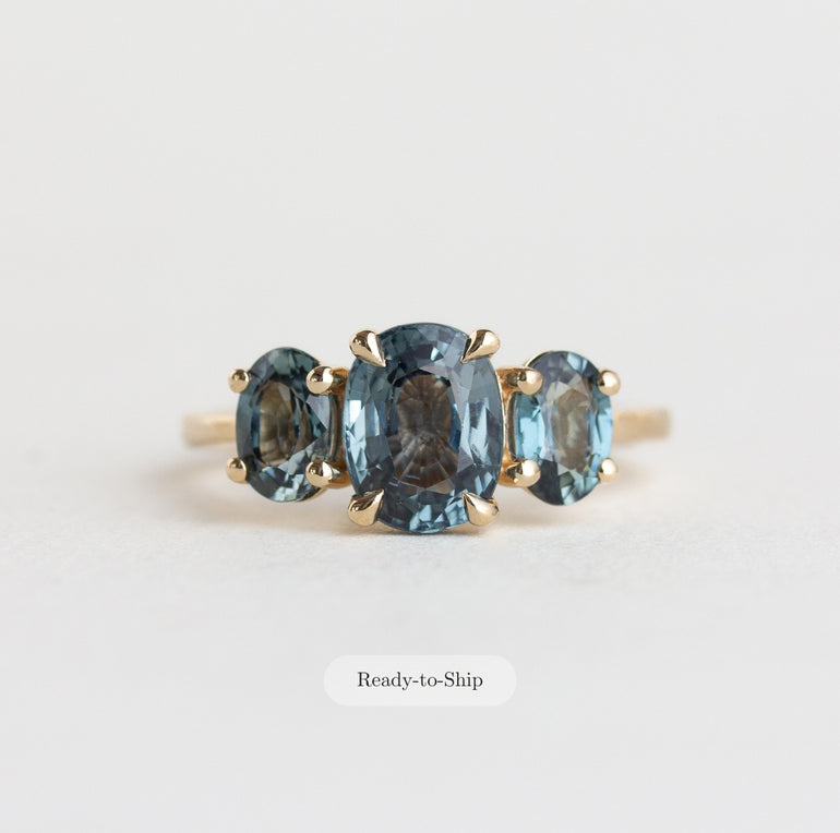 14K gold Isadora ring with three oval blue sapphires