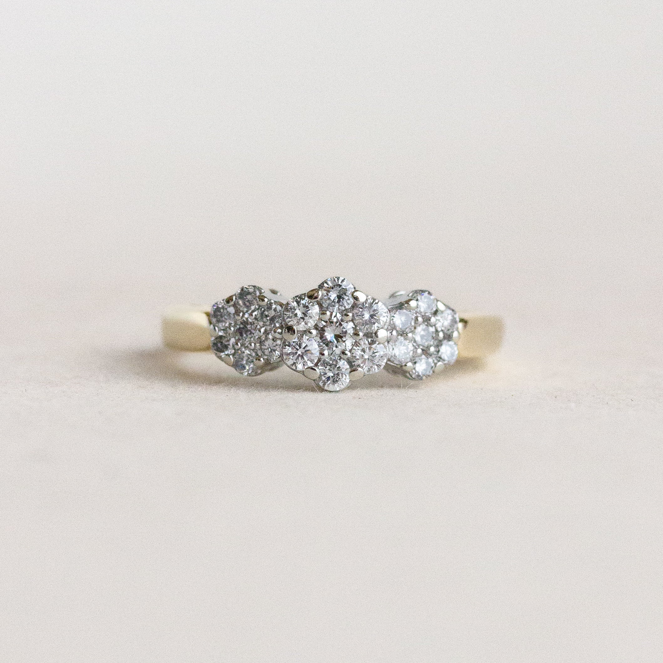 Diamond ring on a light beige background