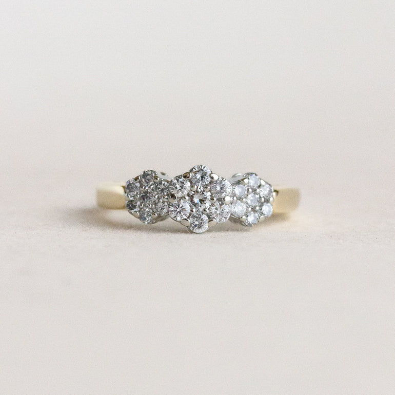 Diamond ring on a light beige background