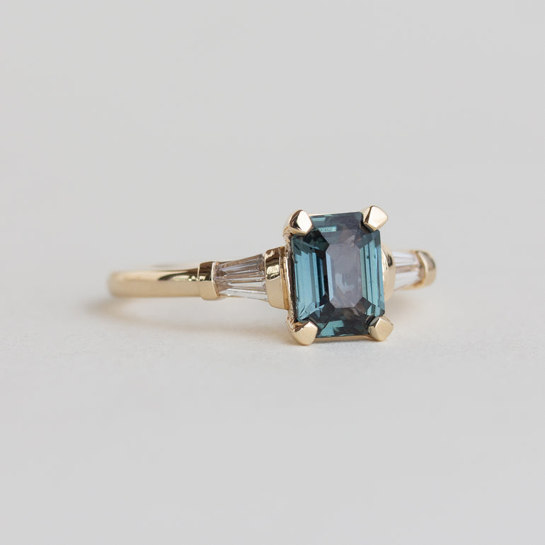 14k gold Art Deco style ring with teal sapphire and baguette diamonds
