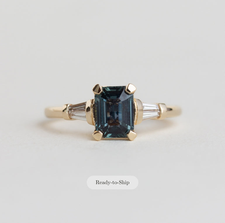 14k gold Art Deco style ring with teal sapphire and baguette diamonds
