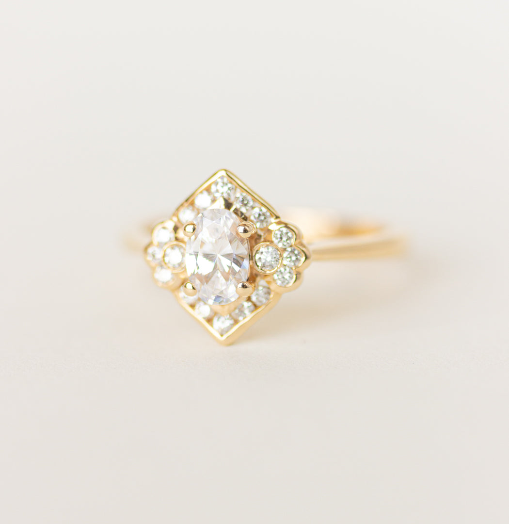 Vintage Inspired Engagement Ring with oval moissanite 