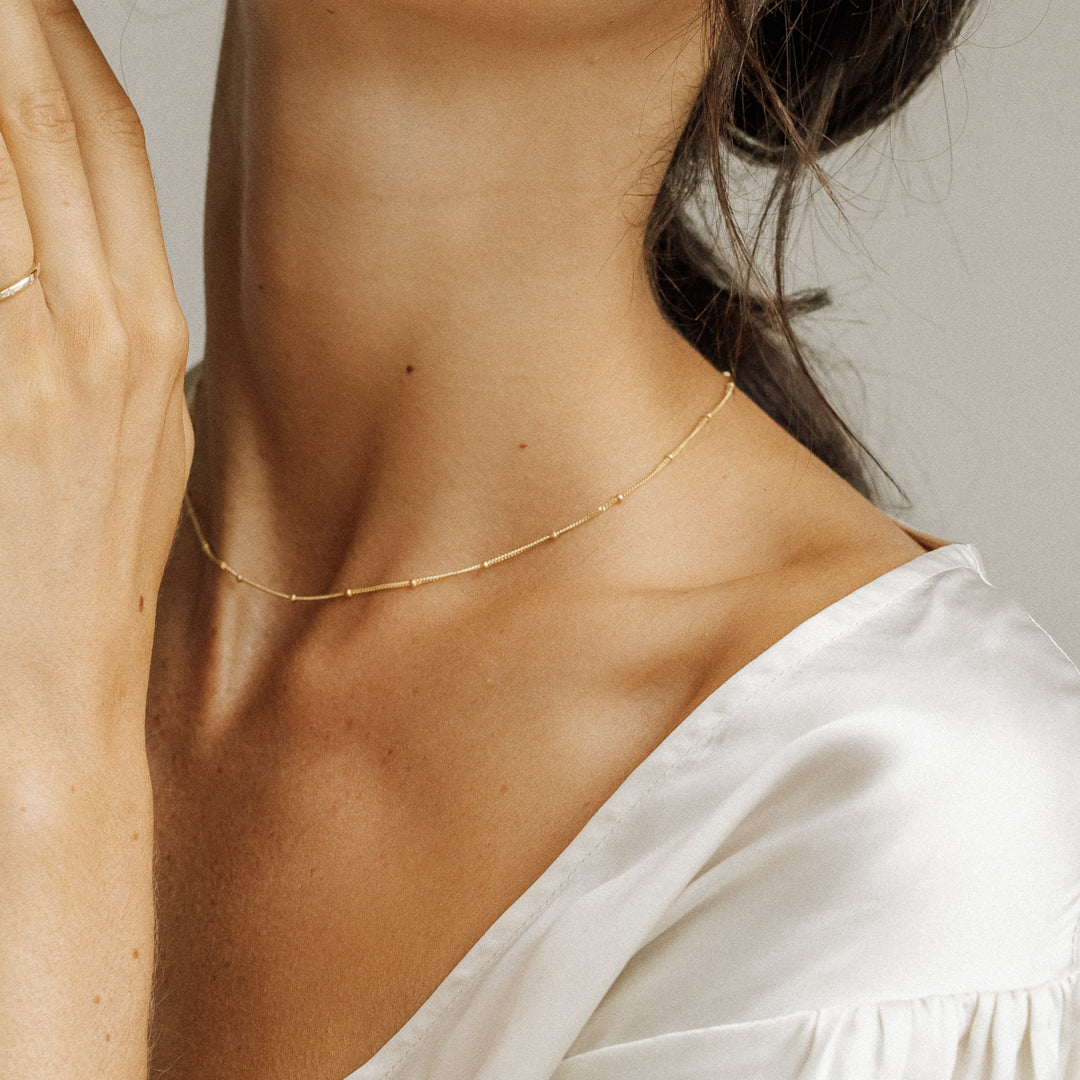 Genevieve Gold Satellite Necklace | White Crystal – Patch Co