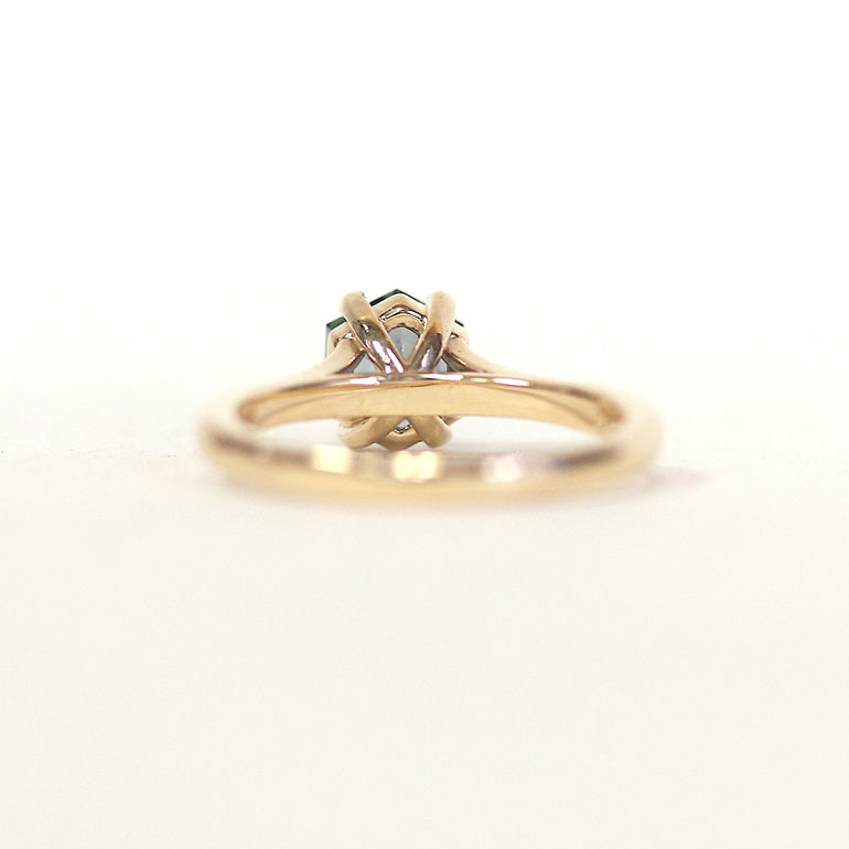 engagement ring with hexagon centre stone