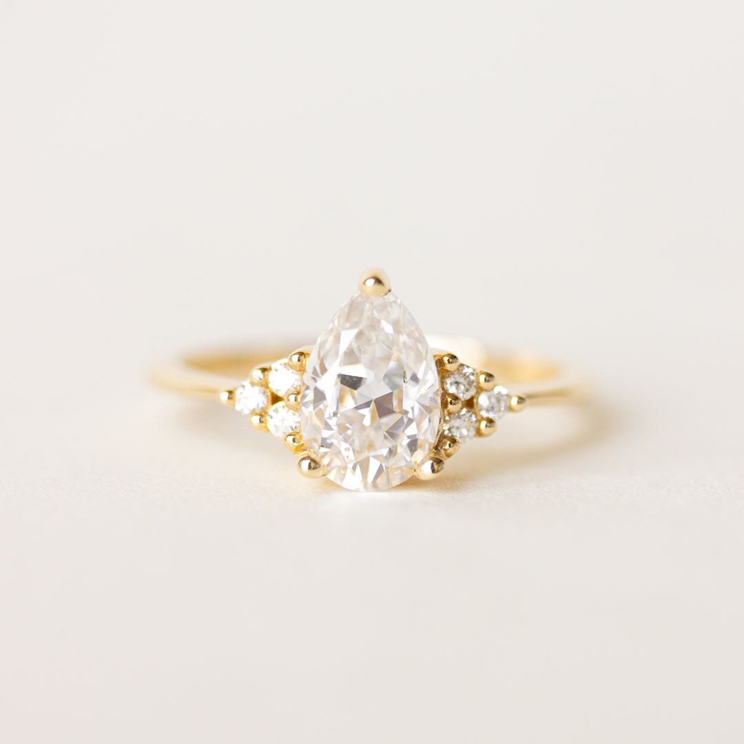 Pear side stone engagement on sale ring