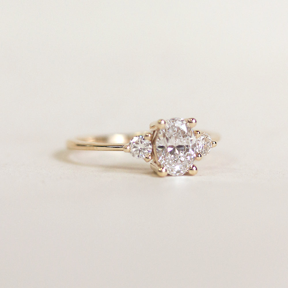 Oval Diamond Engagement Ring With Round Side Stones