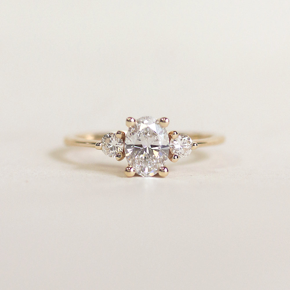 Oval Diamond Engagement Round With Round Side Stones