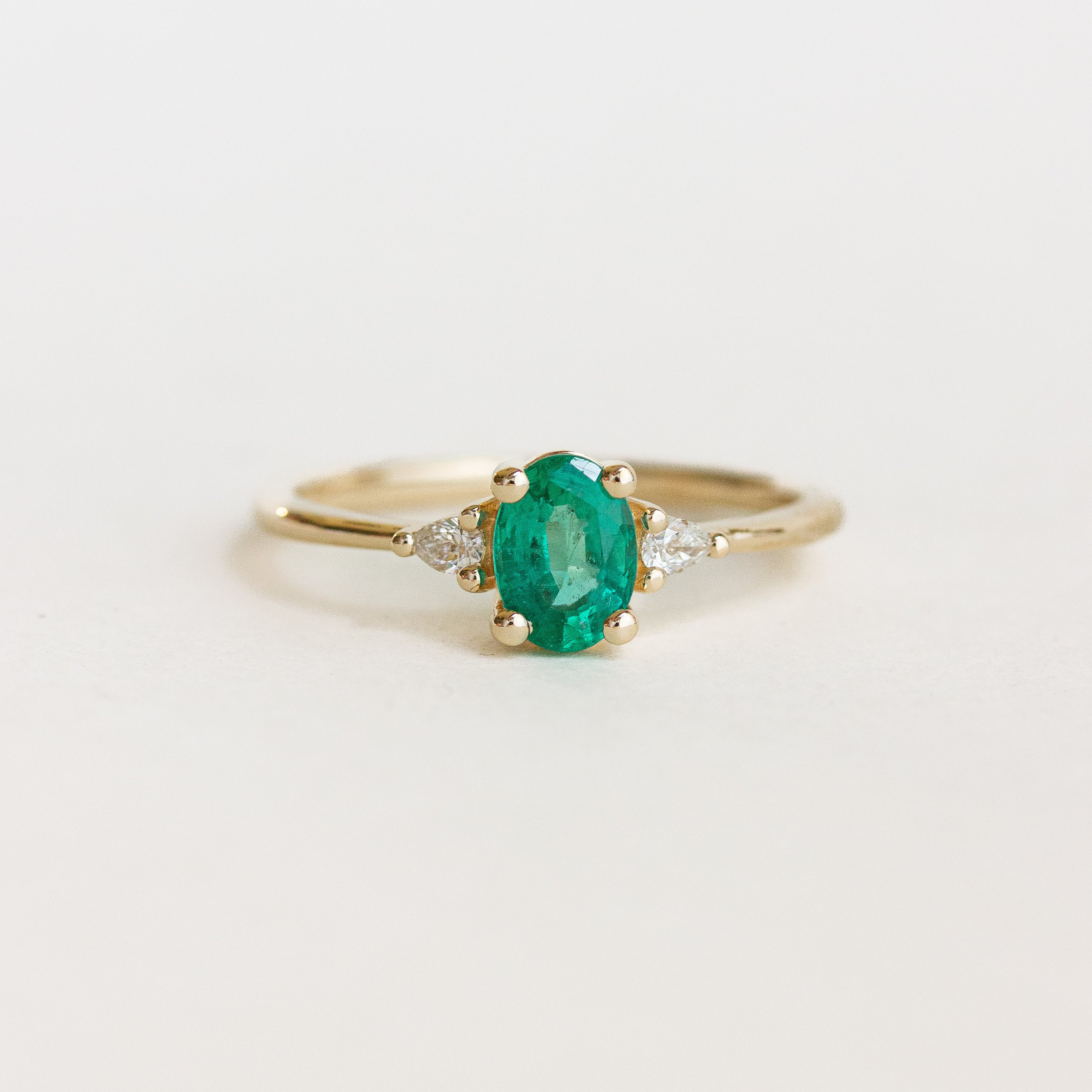 Oval Emerald Pear Sides Engagement Ring