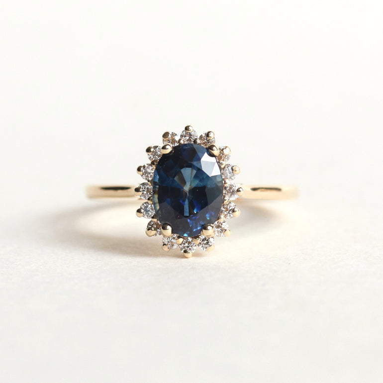 Oval Sapphire Halo Engagement Ring