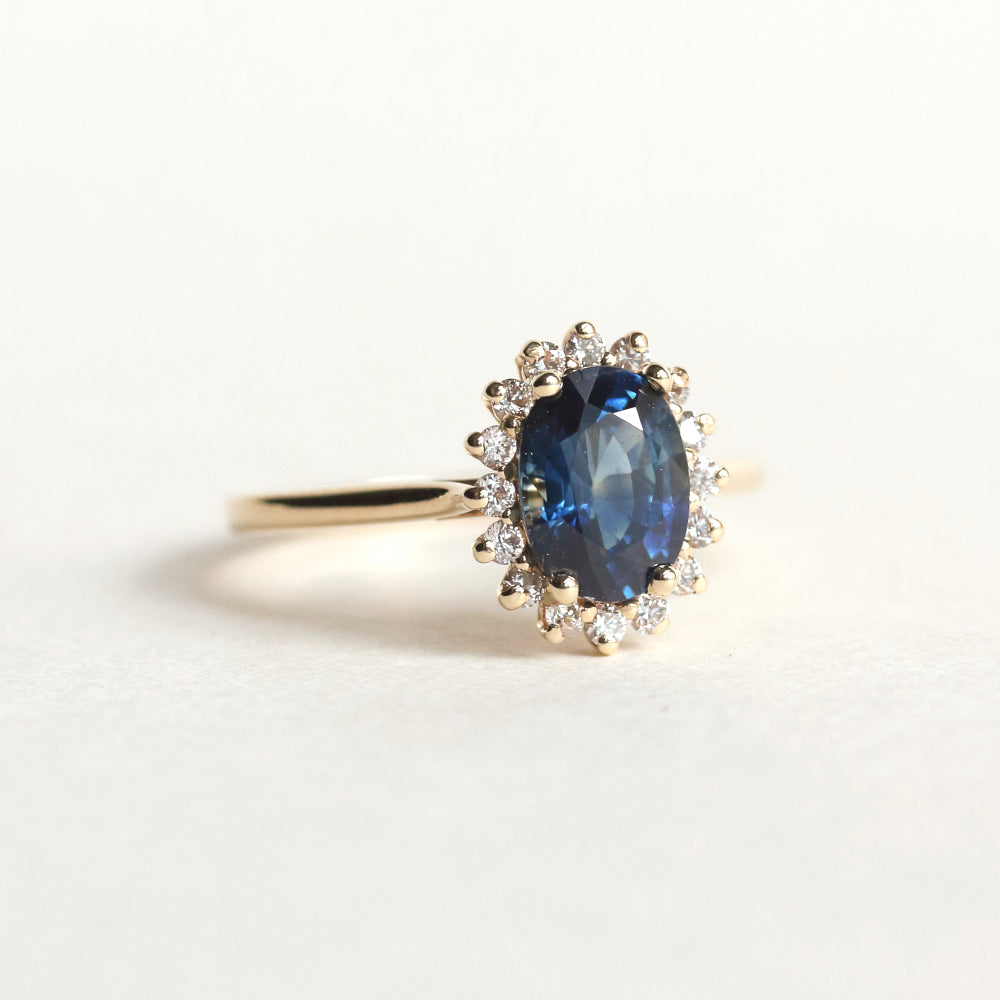 Oval Sapphire Halo Engagement Ring